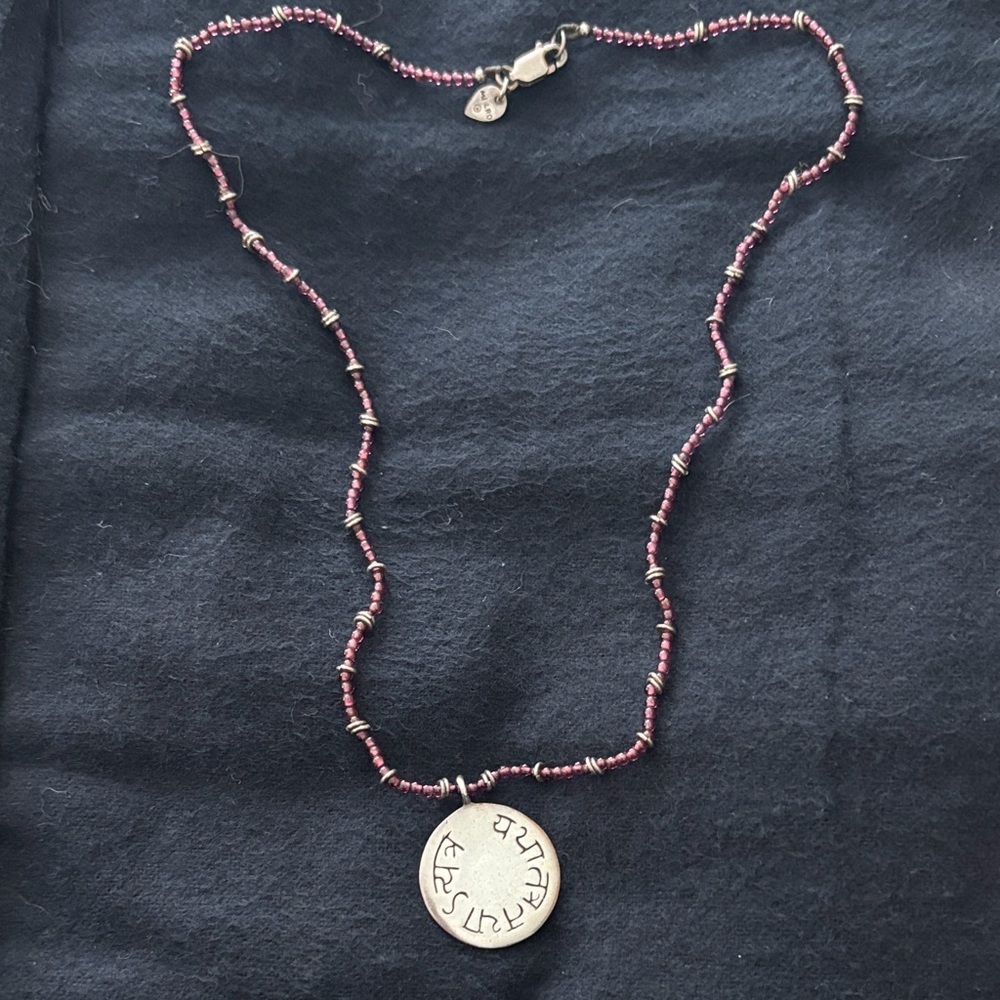 Elegant Beaded Necklace with Silver Pendant